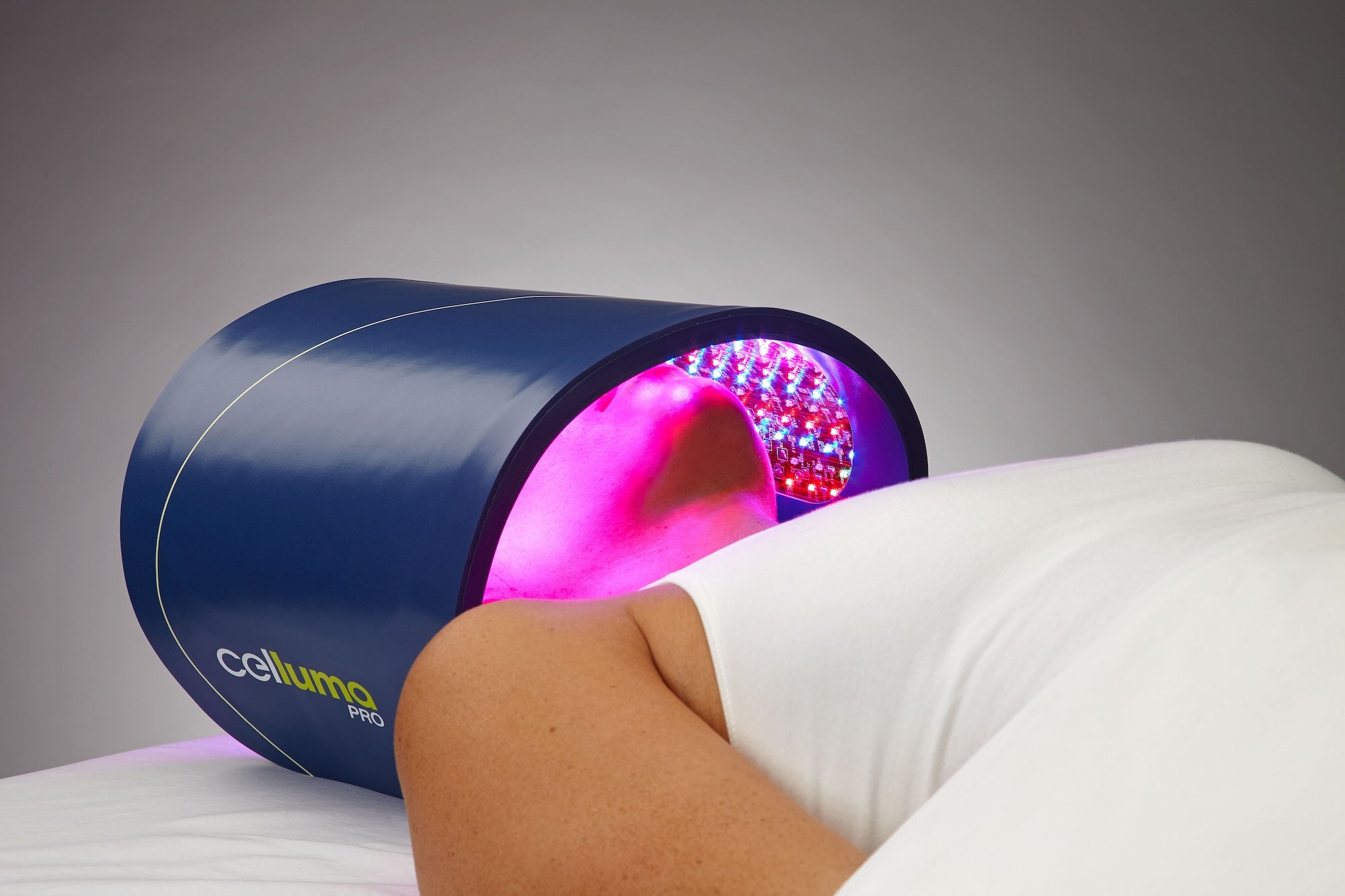 woman with celluma light therapy mask on her face